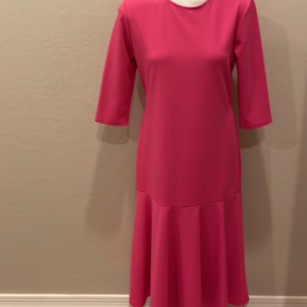 A beautiful bubble gum pink mermaid style dress.